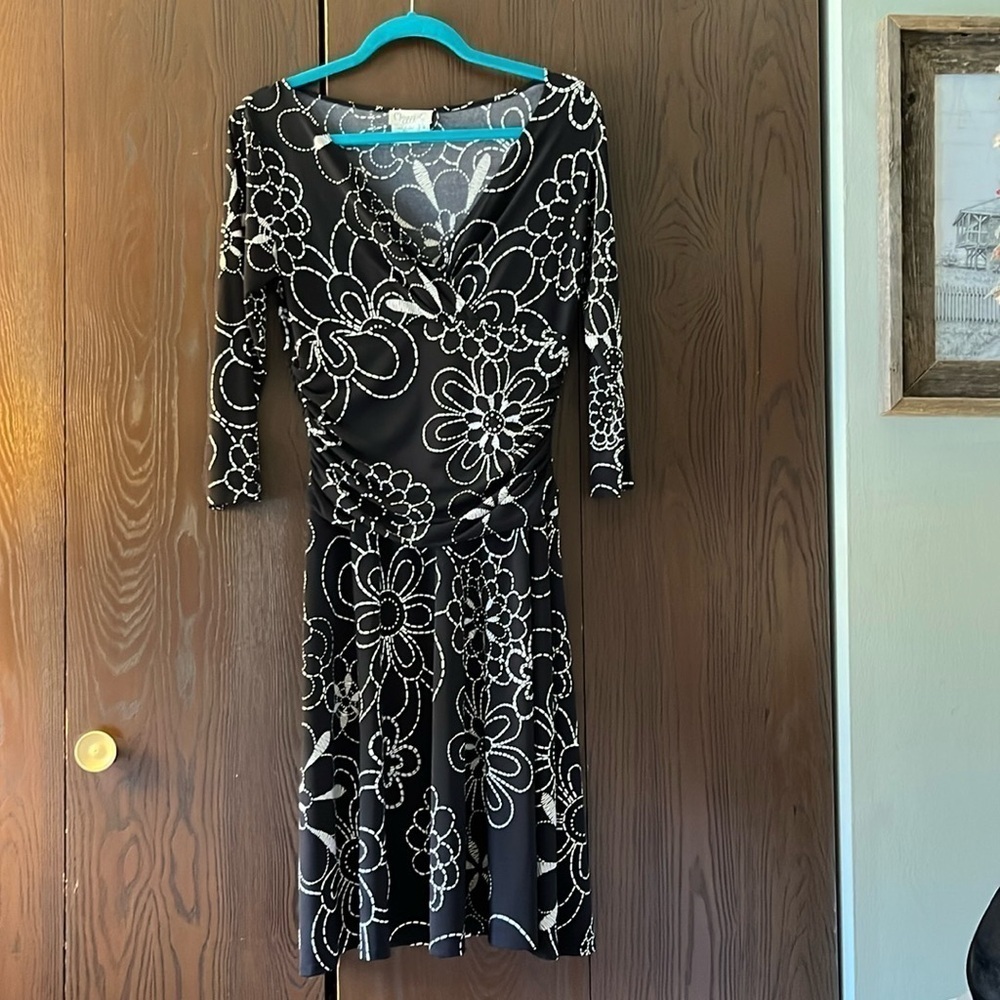 Maggie London 3/4 sleeved black midi dress. Size 8